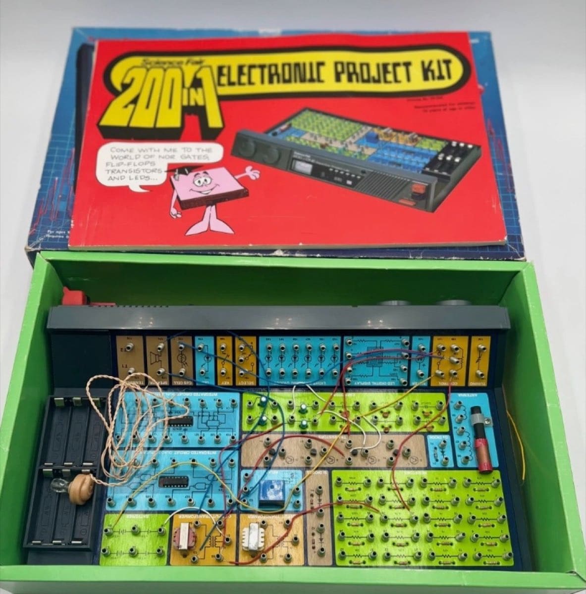 200 in 1 open: green case, blue panels, the wires still in there